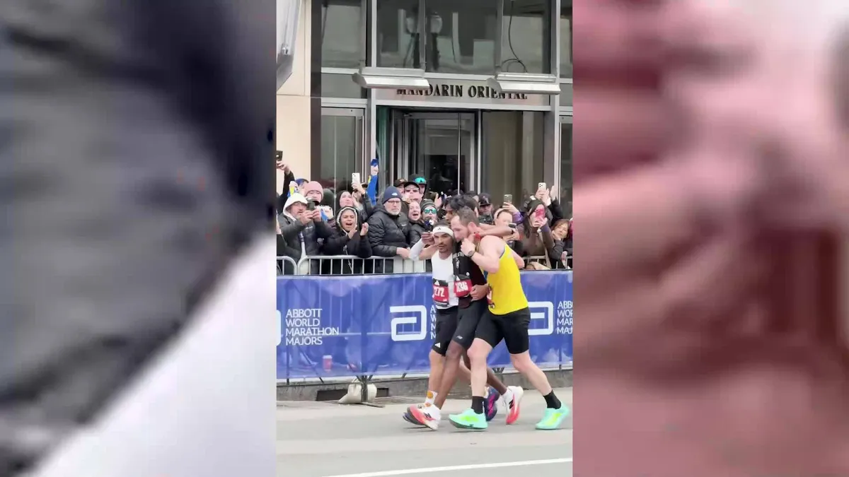Hai runner bỏ thành tích cá nhân, dìu đối thủ kiệt sức về đích ở Boston Marathon